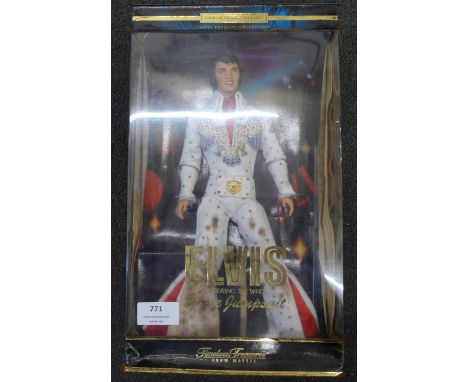 A Mattel figure, Elvis in white eagle jumpsuit, 1973, boxed, 2000 