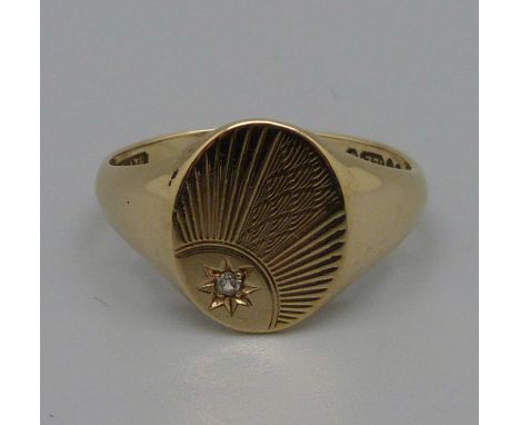 A 9ct gold, diamond set signet ring, 4.1g, U 