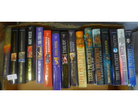 Sixteen Terry Pratchett first edition hardback novels 