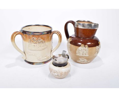 A group of 19th century silver mounted salt glazed stoneware itemsTo include a tyg with three looped reeded handles and relie