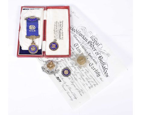 A cased silver and enamel Order of the Buffaloes jewelFurther silver enamel items to include watch fobs, one connected to foo