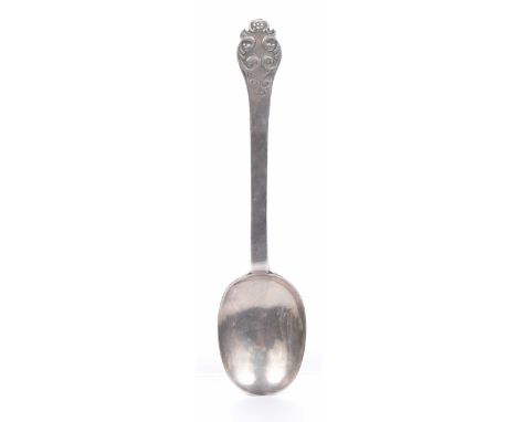A James II silver lace-back trefid spoon,With ribbed rat-tail and scroll detail to the back of bowl and front of stem, the re