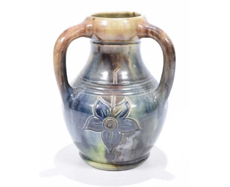 An English pottery Linthorpe style vase, early 20th centuryOf rounded ovoid form applied with three looped handles, sides wit