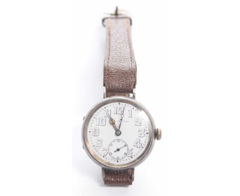 An early 20th Century manual wind silver wristwatchThe white circular dial with black outlined Arabic numerals, subsidiary di