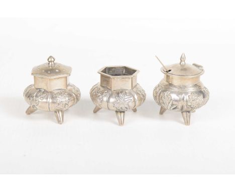 A Chinese export silver three-piece cruet, early 20th CenturyComprising pepperette, salt and lidded mustard pot and spoon, ea