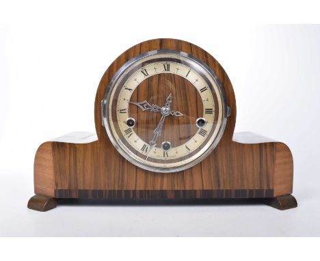 A walnut veneered Art Deco mantle clock, early 20th century13cm silvered dial with Roman numerals, Westminster chimes, height