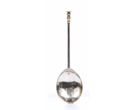 A mid 17th century English Provincial silver seal top spoon Possibly Lincoln, the tapered faceted stem with fluted baluster k