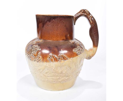A large 19th century relief moulded salt glazed jugOf rounded ovoid form rising to a tapered cylindrical neck and short spout