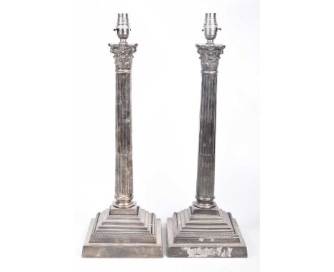 A pair of classical form table lampsThe square section stepped base extending to a Corinthian column terminating at a scroll 