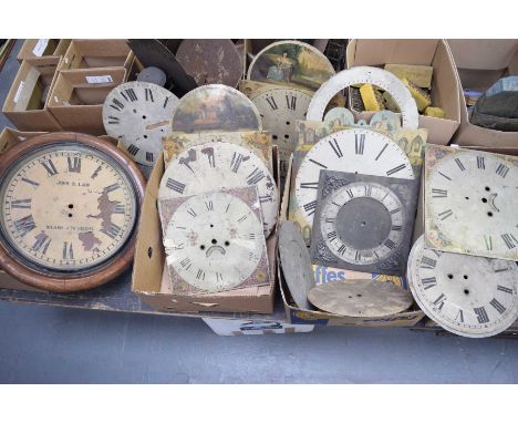 A collection of longcase clock dialsTo include 18th and 19th Century painted dials, a circular brass dial, brake arched dials