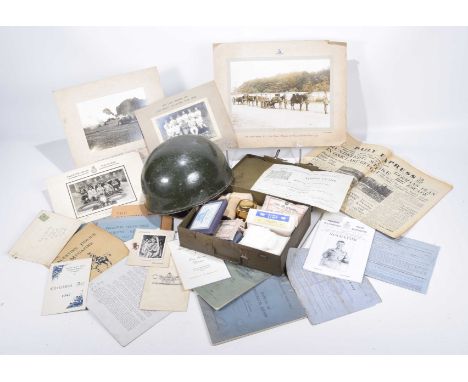 Green painted army helmet, mid-20th centuryWith leather lining, a cased outfit First Aid for tanks and armoured cars, inside 