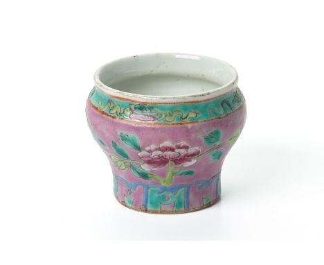 A MINIATURE PINK GROUND PORCELAIN SPITTOON Decorated with peonies and lotus motifs and a light teal outer rim of auspicious s