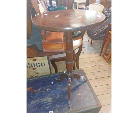 An antique mahogany tall pedestal wine table, set on turned pillar and tripod base - sold with a lower reproduction example