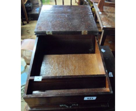 A vintage wooden table desk with lift-top lid and drawer to front