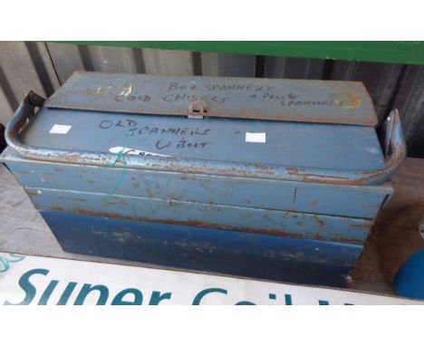 A metal concertina tool box containing a quantity of tools including spanners, etc.