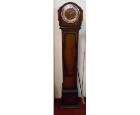 A vintage oak cased grandmother clock with English eight day chiming movement