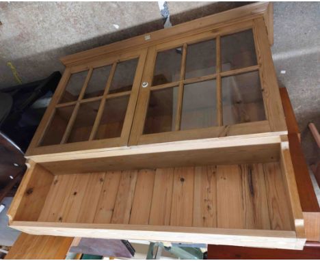A 1.17m 20th Century pine dresser top with two shelf plate rack enclosed by a pair of glazed panel doors, bearing plaque for 
