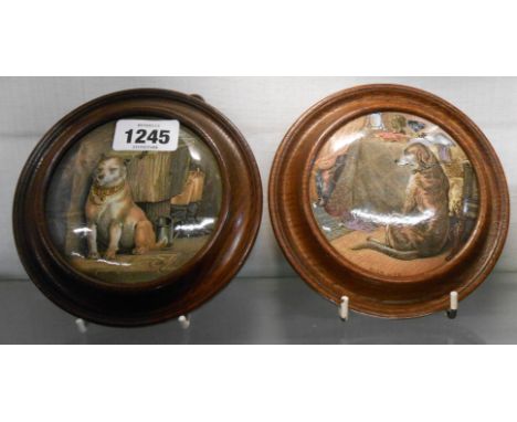 A pair of Victorian oak framed Prattware pot lids entitled High Life and Low Life, each one depicting a dog