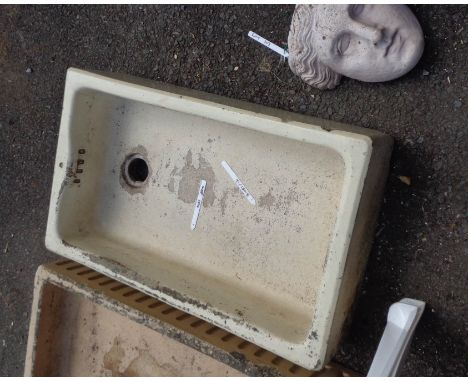 A large ceramic butler's sink