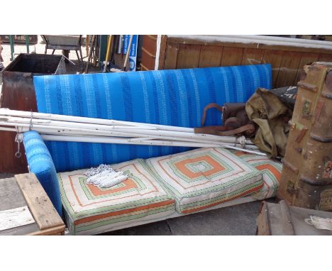 A vintage 'Bedford' garden swing manufactured by Fitter Bros. of Birmingham and retailed through Harrods comprising upholster