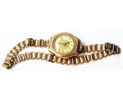 An early 20th Century 9ct. gold cased lady's wristwatch, with plated bracelet - 15 ruby movement a/f