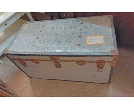 A 1.02m vintage blue painted plywood transit trunk with iron mounts and strapping - top marked for J.A. Spiller, 19 Silver St