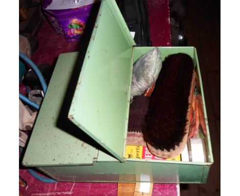 A vintage Tala painted tin shoe cleaning box containing a quantity of polishes, brushes, etc.