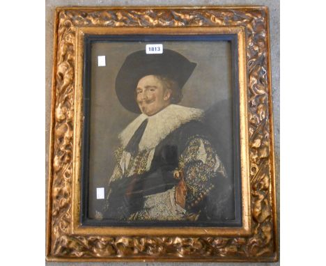 An ornate gilt framed coloured print of The Laughing Cavalier