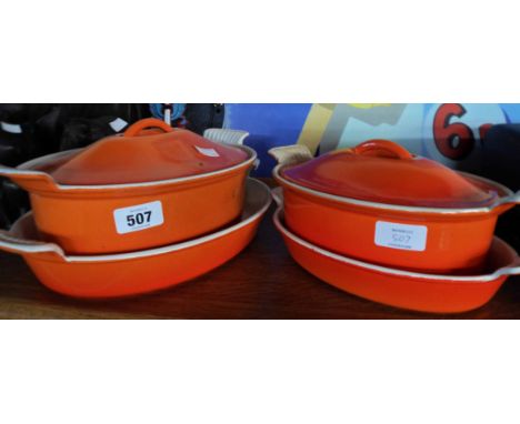 Two French cast iron and enamel oven to table casserole dishes by Cousances - sold with two similar dishes