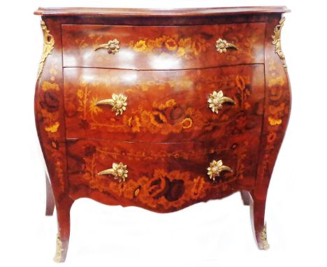 A 75cm 20th Century reproduction marquetry style bombe commode chest with serpentine top, floral decoration and three long dr