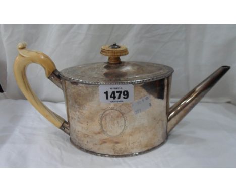 A silver elliptical teapot with hinged flip-top, perished ivory mounts and initials to cartouche - London, 1827