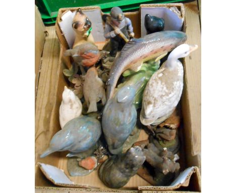 A box containing a quantity of ceramic figurines including Babbacombe pottery cat, Trevean Cornwall kingfishers, etc.