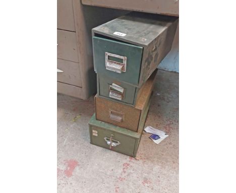 Four vintage green painted metal filing drawers