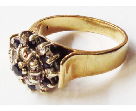 A vintage 375 gold sapphire and diamond cluster ring - boxed