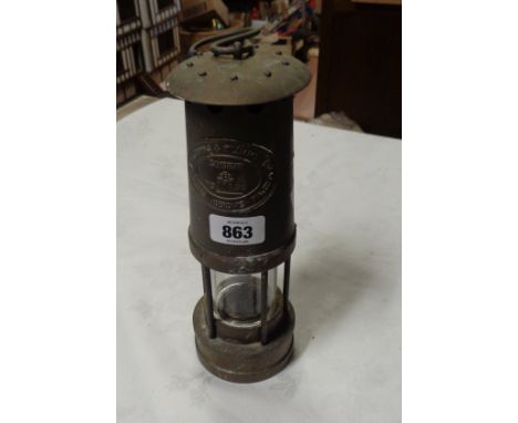 A brass miner's lamp made by Thomas &amp; Williams Ltd, Aberdare, Wales