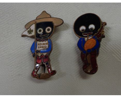 Two vintage Robertson's Golly Golden Shred Marmalade enamel pin badges, one depicting a Boy Scout, the other a bagpipe player