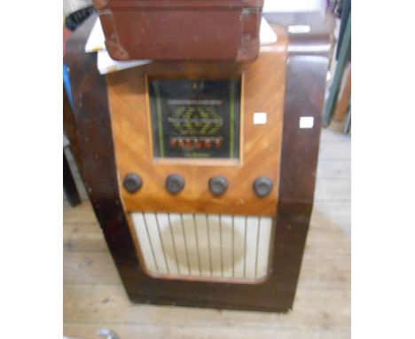 A vintage wooden cased Bush Type SUG26 valve radio of tall console form with contrasting veneer finish - sold with a vintage 