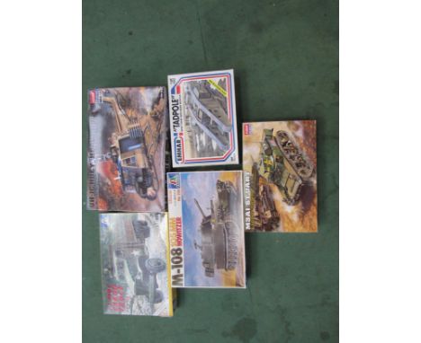 Five assorted 1:35 scale military vehicle plastic model kits to include Academy UH-1C "Heavy Hog" and M3A1 Stuart Light Tank,