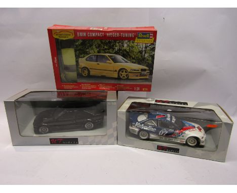 Two boxed UT Models 1:18 scale diecast BMWs and a BMW Compact 'Rieger Tuning' plastic model kit (3)