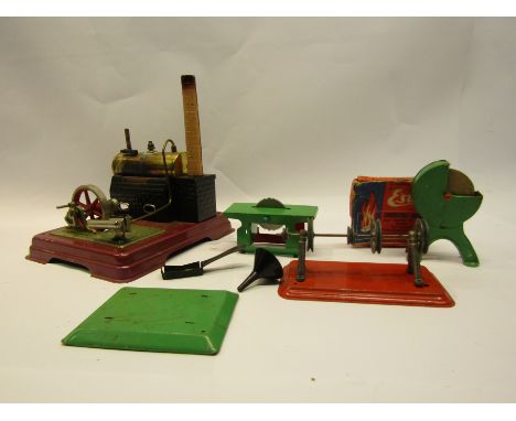 A Fleischmann live steam stationary engine with accessories including grinding wheel and saw table