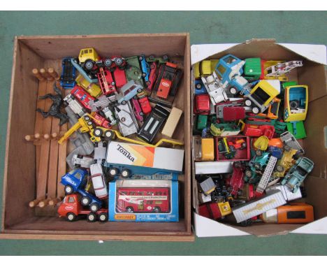 Two boxes of mixed playworn diecast vehicles, boxed Matchbox K-15 bus, Tonka toys etc