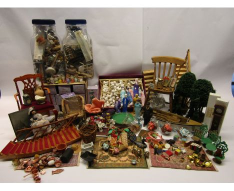 A collection of assorted dolls house accessories, model fishing boat, miniature elm slat back chair, bisque doll parts etc 