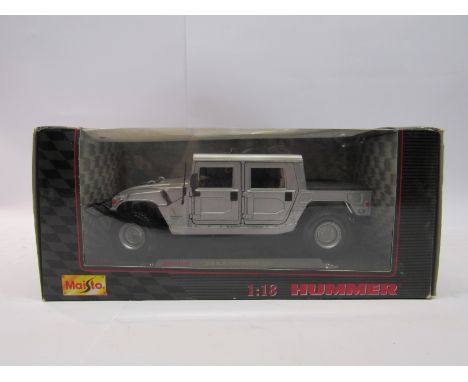 A boxed Maisto diecast 1:18 scale Hummer