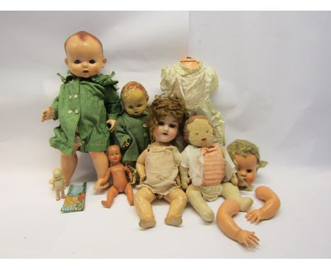 A collection of dolls including Armand Marseille bisque head example Pedigree waling doll etc 