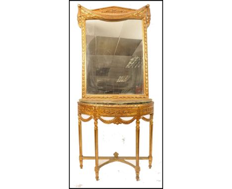 An impressive 20th century Italian rococo revival marble and gilt plaster wood rococo mirror back console table. The half moo