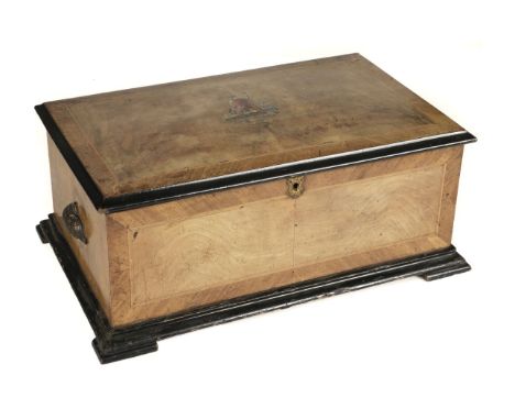 * Mechanical Music. A late 19th century Swiss "The Britannia" Polyphon by B.H.A. of St. Croix, the rectangular walnut and ebo