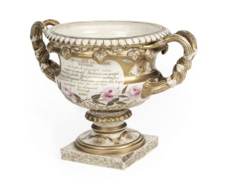 * Coalport. A George III "Warwick vase" probably by Coalport c.1820, the elaborate vase with grape and vine moulded handles a