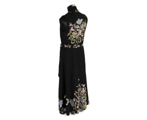 * Liberty. A ladies' embroidered dress, 1930s, sleeveless long black dress of fine wool, lavishly embroidered all over with p