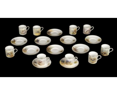 * Royal Worcester. A collection of coffee cans and saucers comprising, a Ptarmigan can and saucer by G. Banks, can 6cm high, 