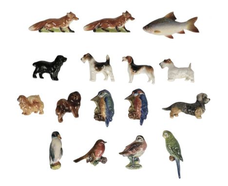 * Royal Worcester. A collection of animal brooches, mostly dogs and birds, comprising two foxes, 7.5cm long, Sealyham, Dandy 